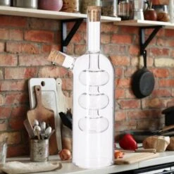 Merkloos Decopatent® 2in1 Olie En Azijnstel Glas - Bolvorm Met Kurken - Glazen Azijnfles & Oliefles In 1 - Oil And Vinegar - 9 X 9 X 21 Cm -Tafelwaren Verkoop 1200x1200 1830